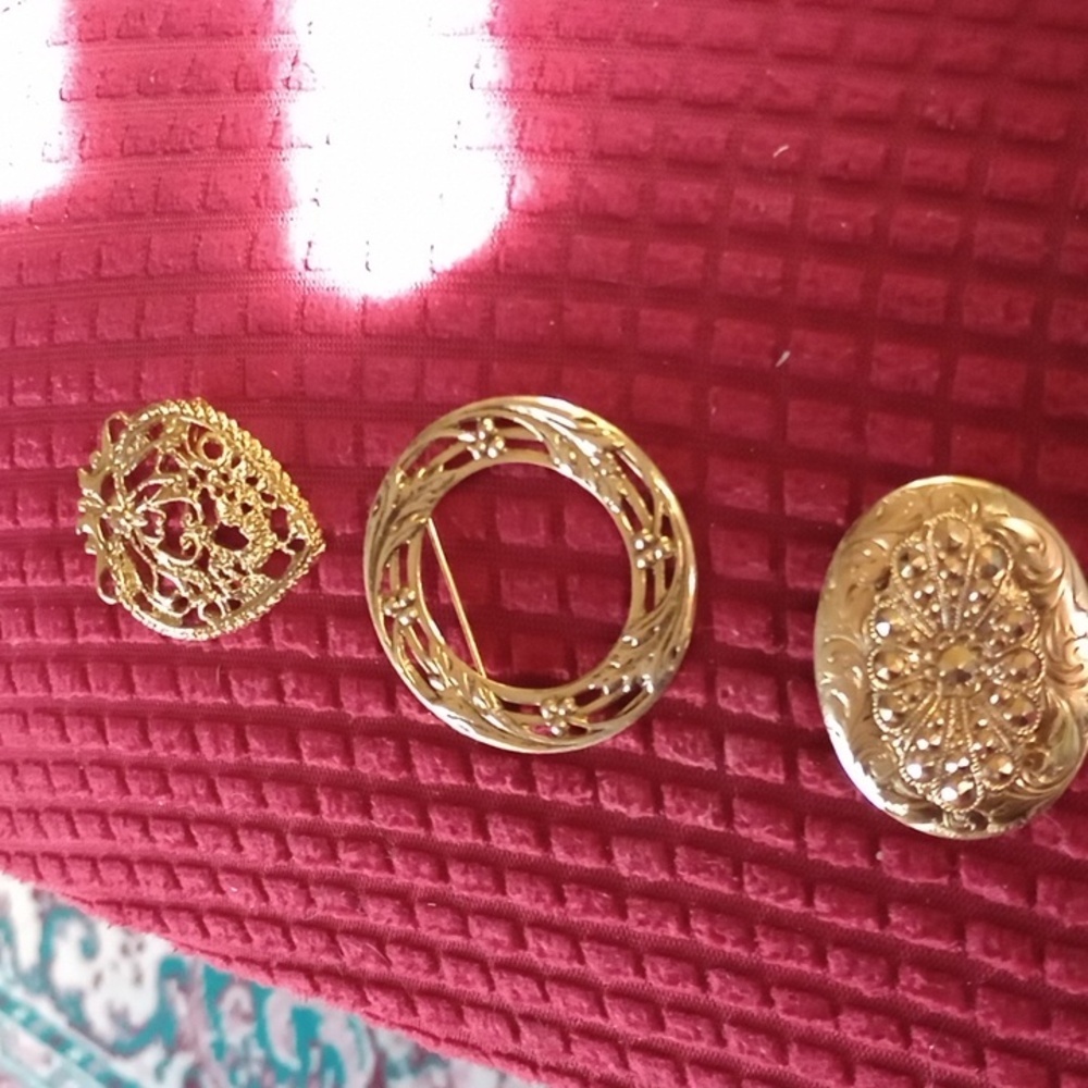 Three vintage brooches